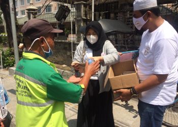 Dampak Pandemi, Gerakan Berbagi Untuk Negeri Bagi Nasi Bungkus